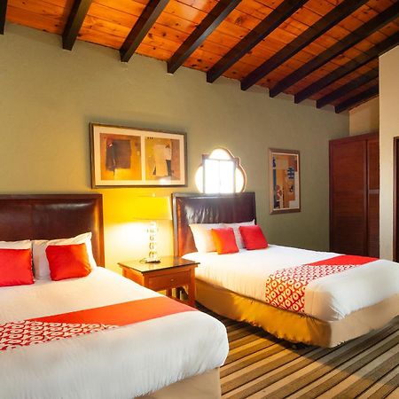 Oyo Hotel Hacienda Don Luis, Rosarito Kültér fotó A typical hotel room