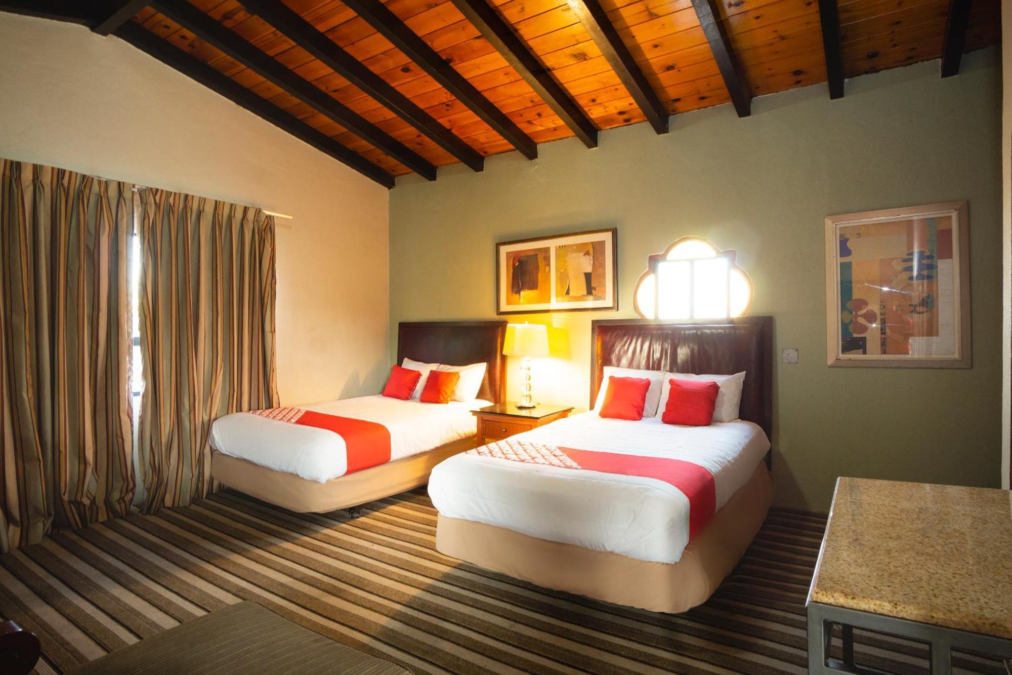 Oyo Hotel Hacienda Don Luis, Rosarito Kültér fotó A typical room at the hotel
