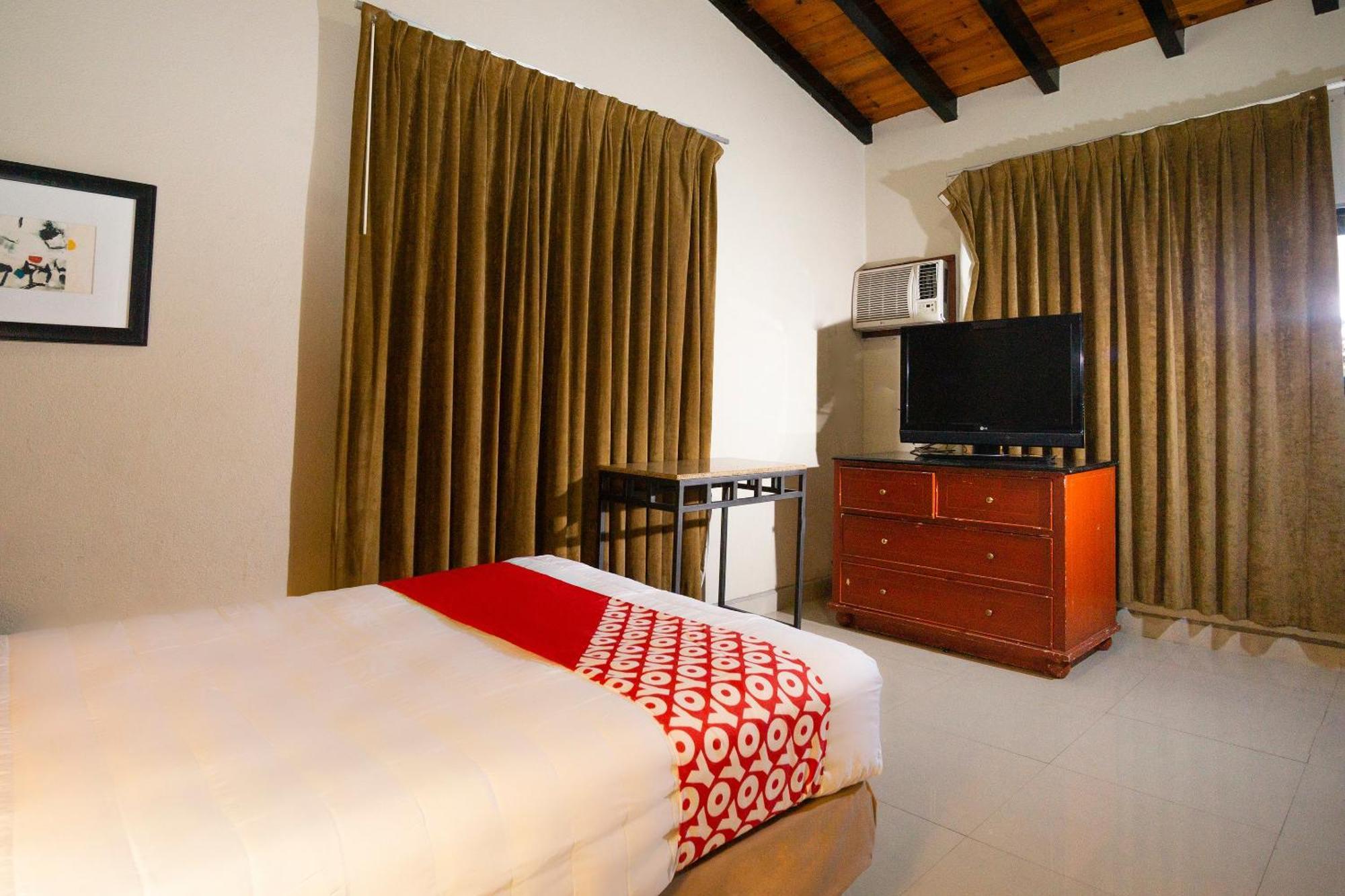 Oyo Hotel Hacienda Don Luis, Rosarito Kültér fotó A room at the hotel